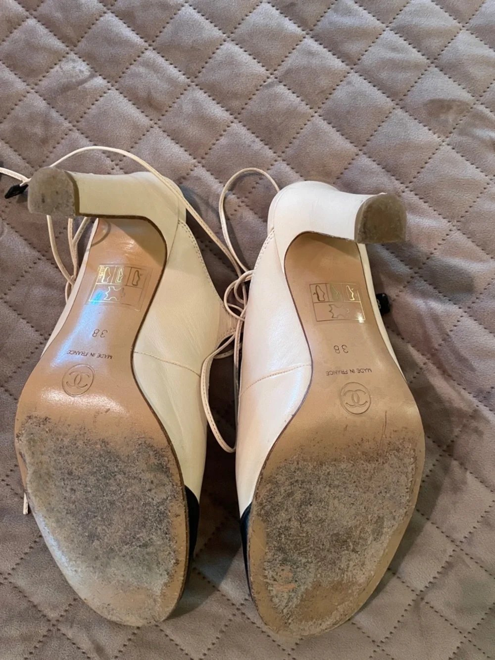 CHANEL Two-Tone T-Strap Pumps in Cream and Black with Logo Heel